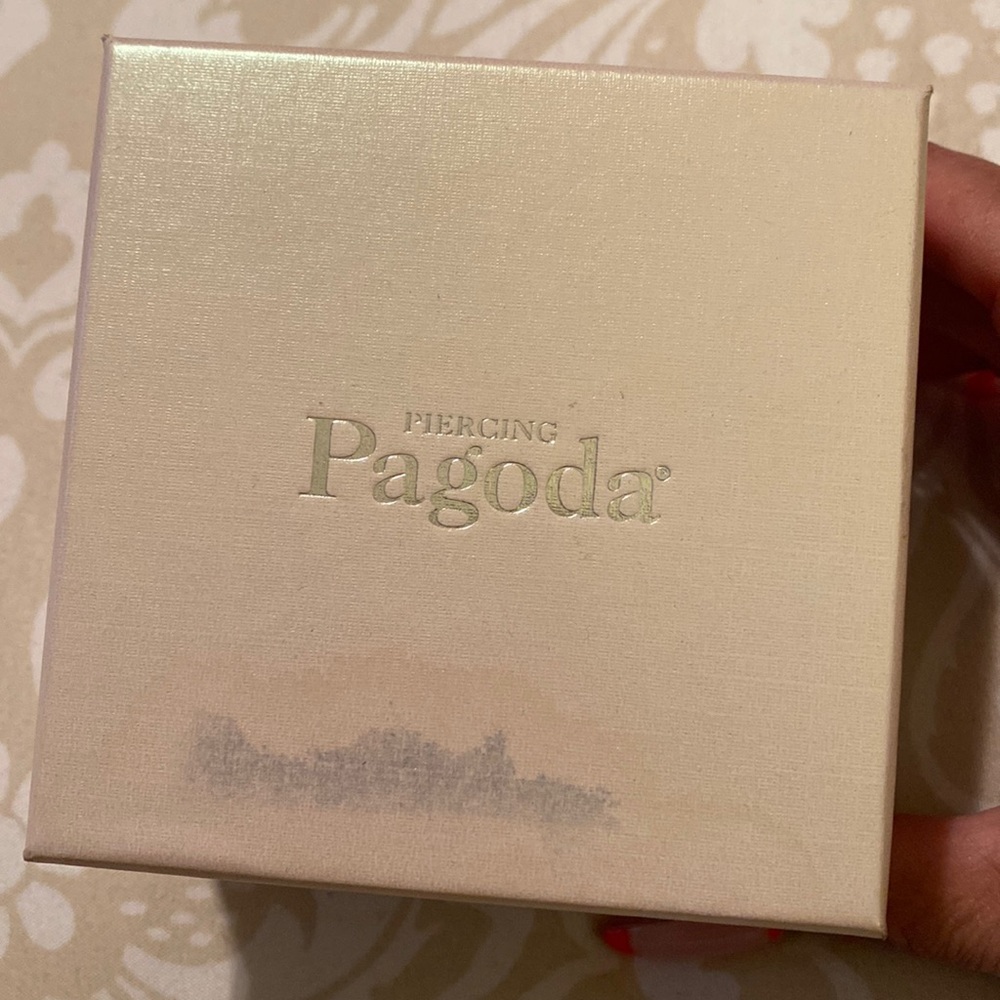 Piercing Pagoda Silver Cross Bracelet